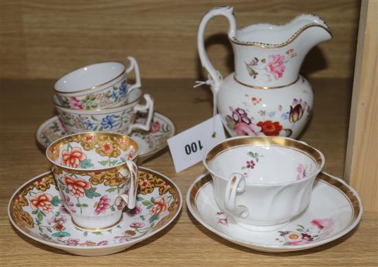 A group of Spode porcelain: a trio, two cups and saucers and a milk jug